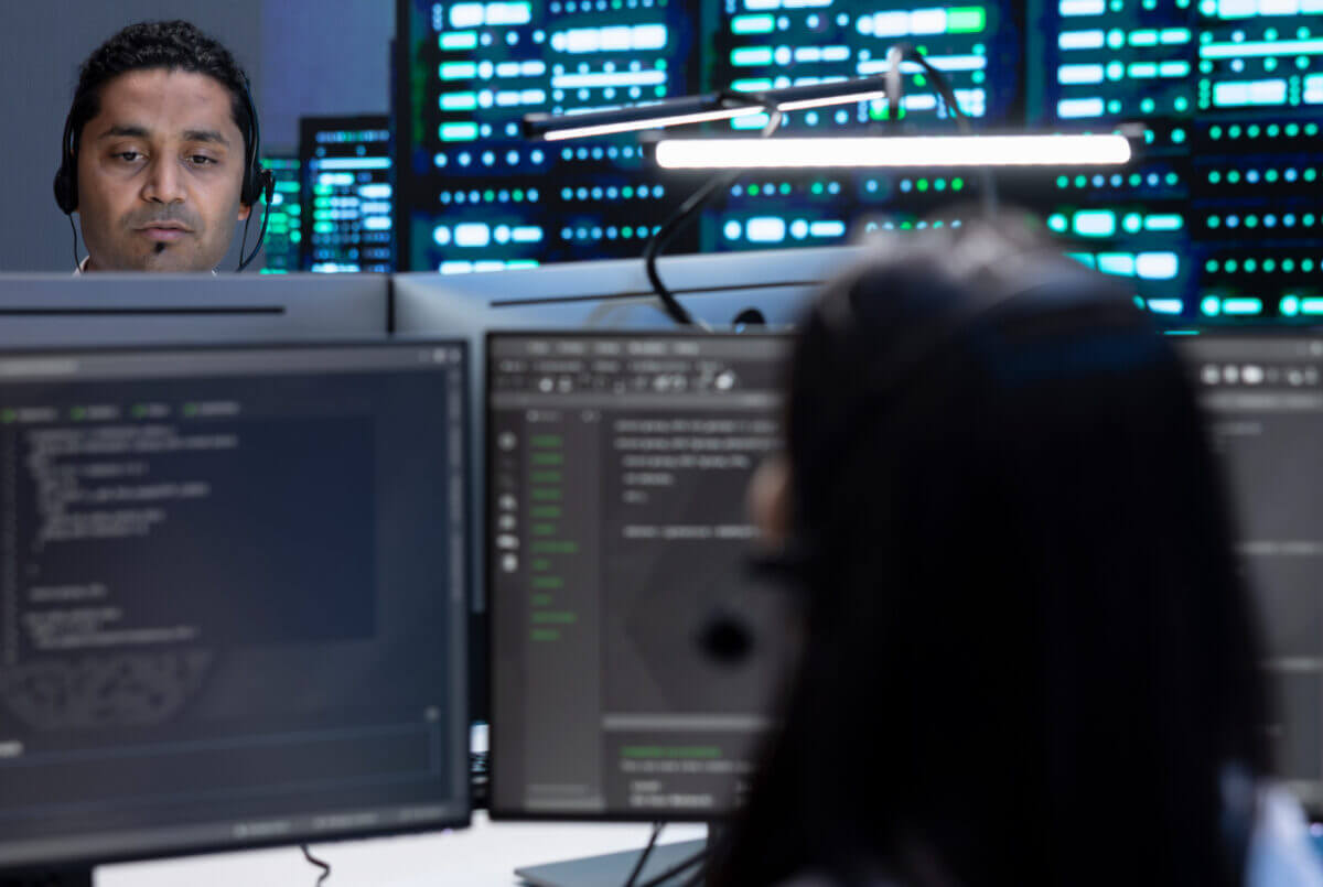 A computer data center with team members