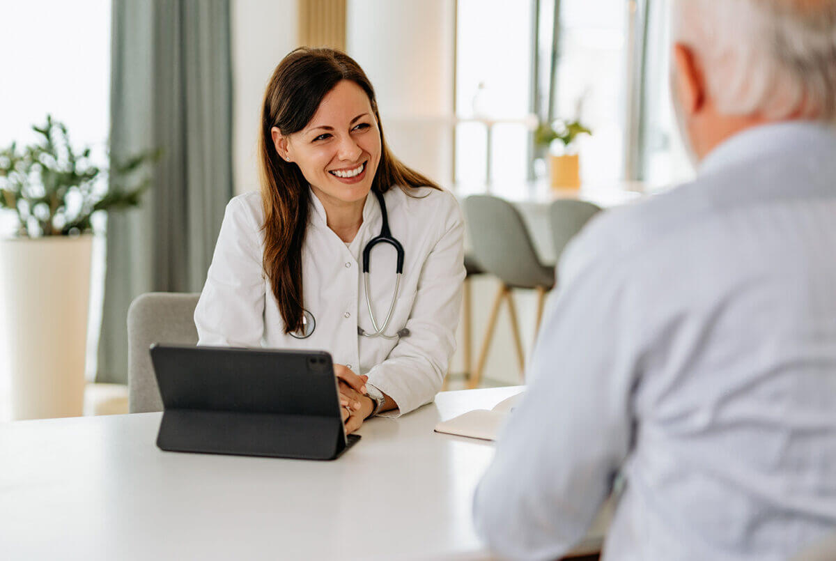 A doctor discusses a diagnosis with a patient